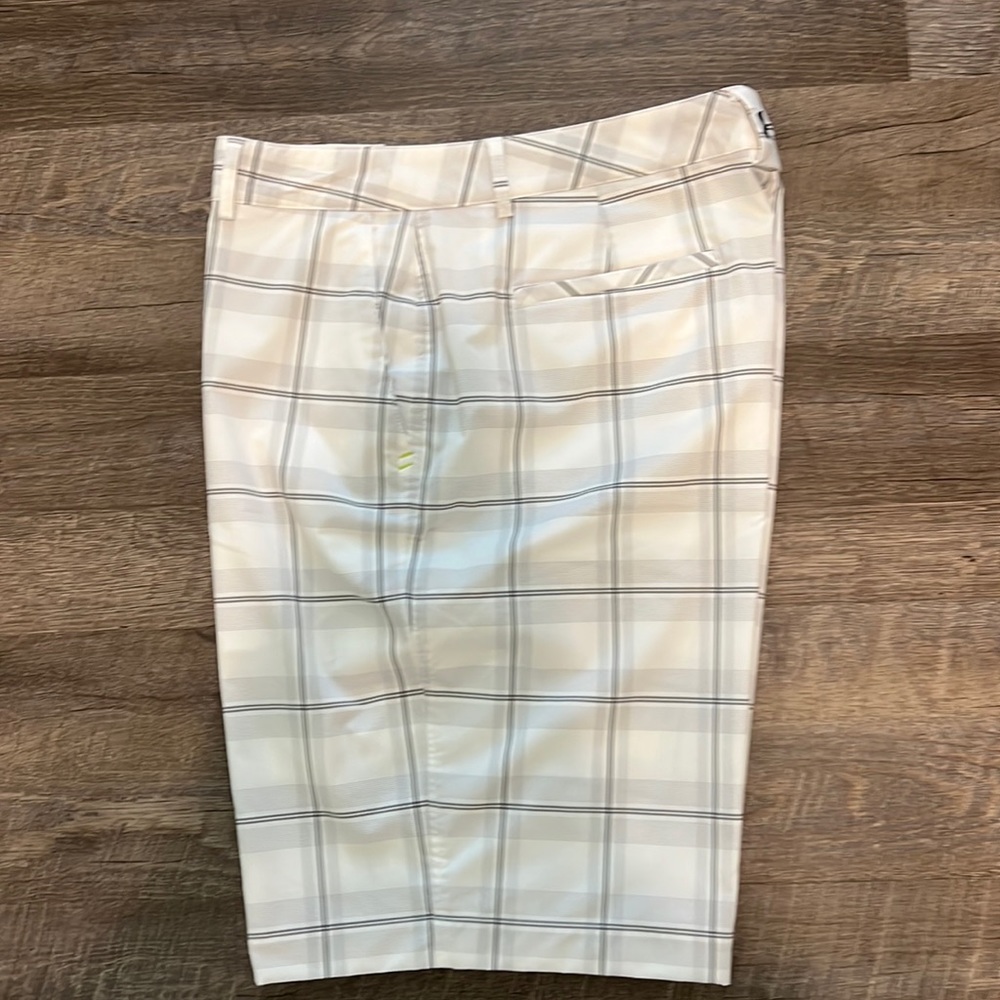 Under Armor golf shorts for men size 38. Never worn